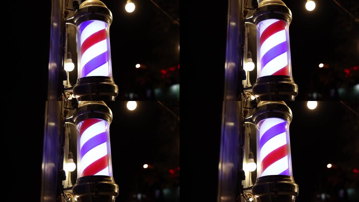 红蓝白灯笼悬挂在男人理发店的特写4k电影慢动作