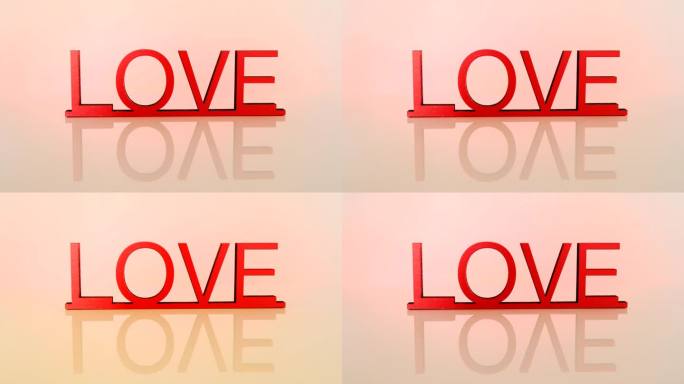 情人节。爱和人际关系。爱的概念。绿底红字“爱”