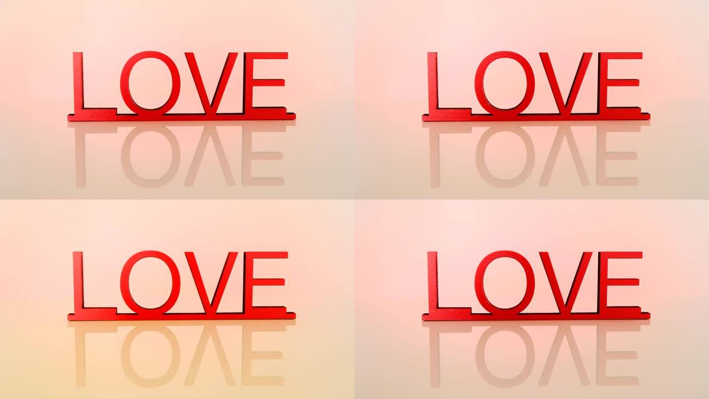 情人节。爱和人际关系。爱的概念。绿底红字“爱”