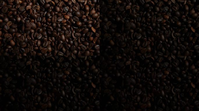 黑咖啡豆背景特写镜头光影变化餐饮行业
