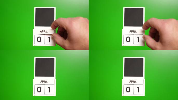 日历上的日期4月1日在绿色背景切割。说明某一特定日期的事件。
