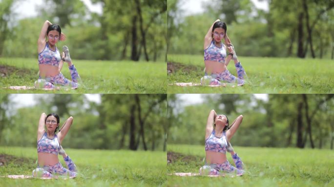年轻女子保持健康和身材，在公园户外做瑜伽