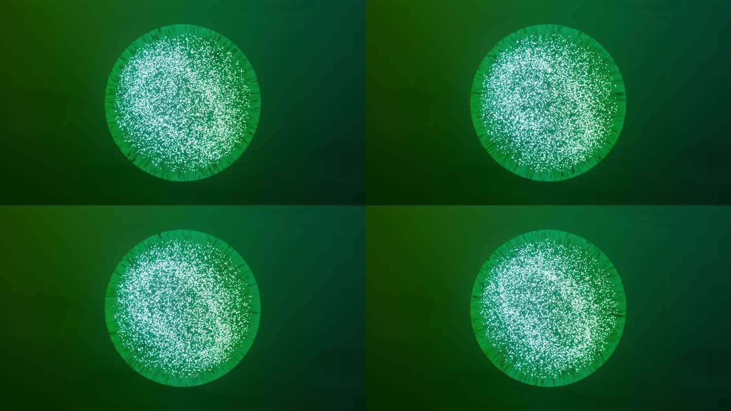 抽象绿色魔球，电脑生成背景。由发光的氖粒子形成的彩色气体形状。shine元素的3d渲染无缝循环人工智