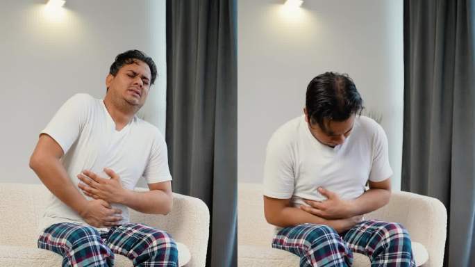 一名印度男子在家遭受腹痛。垂直视频