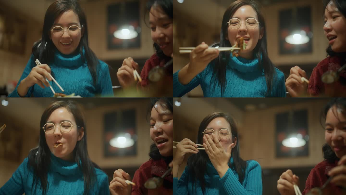 亚洲女性用筷子吃日式烧肉，享受在一起的时光。