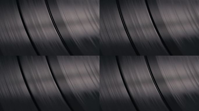 旋转黑胶唱片的宏观纹理凹槽。怀旧的音乐。复古的氛围。