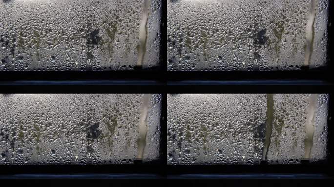 冬天窗户上的水珠玻璃窗上的水滴