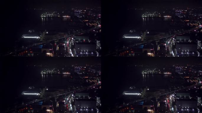 大阪关西国际机场海湾地区夜间延时鸟瞰海洋建筑照明4k
