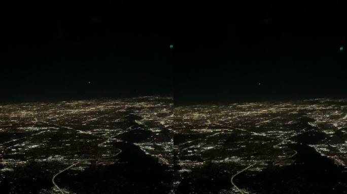 夜间飞行。在芝加哥上空飞行