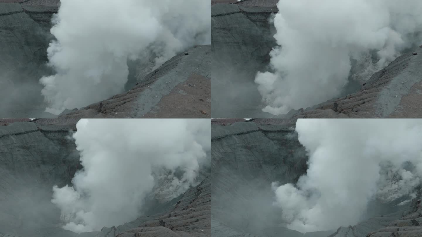日本阿苏山鸟瞰图，捕捉火山冒出的烟雾，由无人机拍摄，达到电影效果