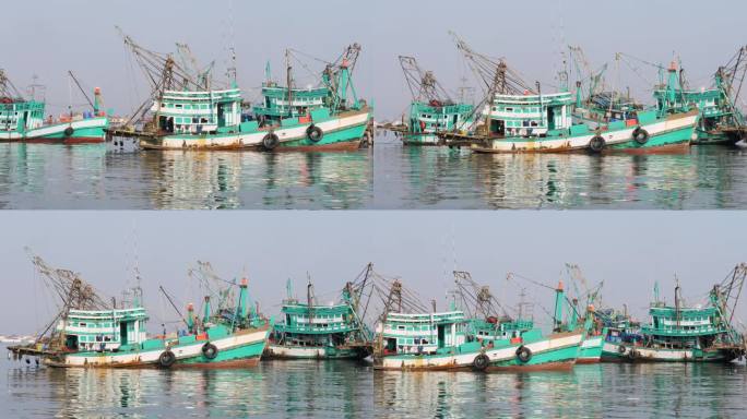 渔港里生活的流动，出海的木蟹渔船被返航的木蟹渔船所取代