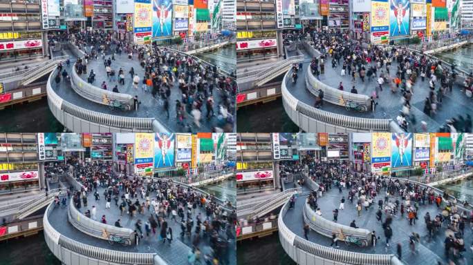 日本大阪，道顿堀街购物市场的人群