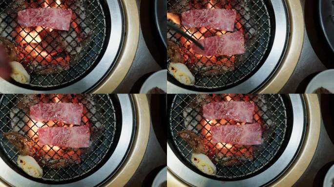 近距离拍摄日本餐厅的烤牛肉。在炉子上烤烧烤。