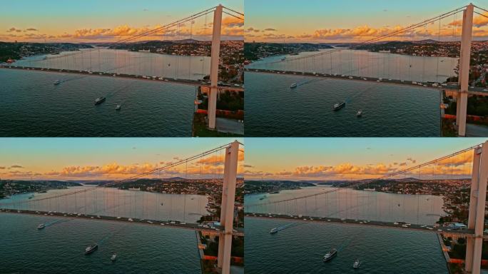 壮观的博斯普鲁斯大桥航拍:无人机拍摄的7月15日烈士桥和迷人的日落时分的博斯普鲁斯海峡。