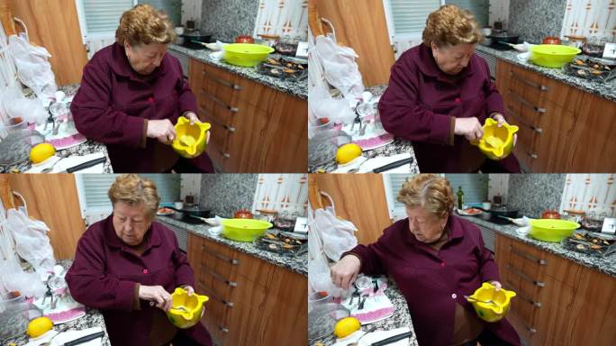 奶奶坐在厨房里，在碗里拌食材做酱