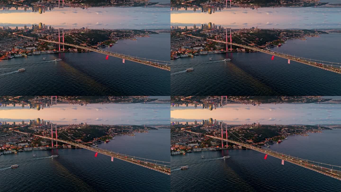 空中的博斯普鲁斯大桥和金融区:7月15日烈士桥和伊斯坦布尔欧洲一侧的镜像效果空中奥德赛。