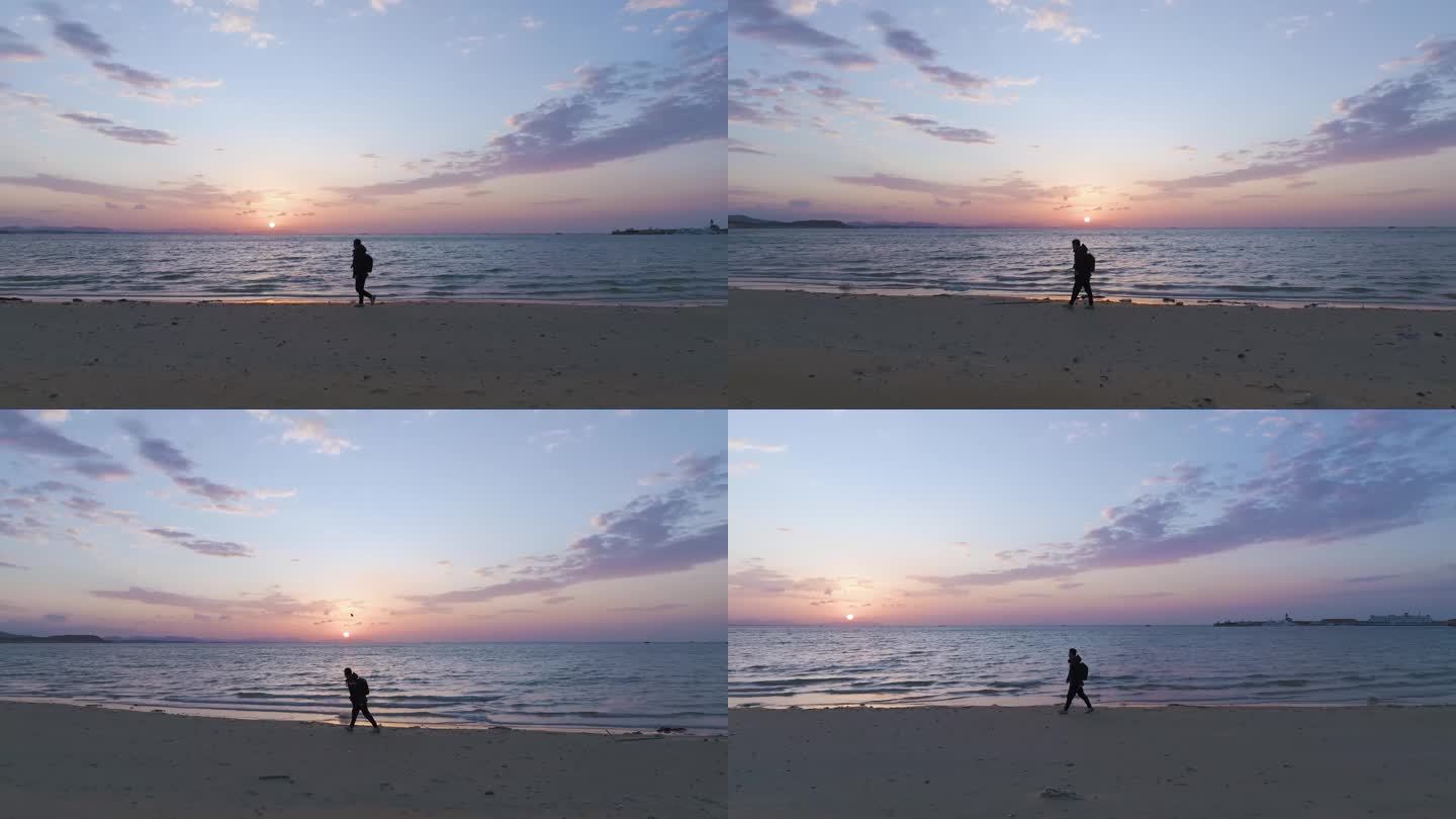 航拍海面夕阳一个人走在海边