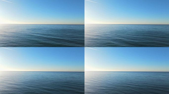 地平线分为淡蓝色的天空和蓝色的海洋。