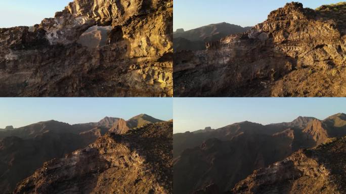 巨人洞的航拍视频。太阳把金色的光芒洒在山峰和山谷上。这个视频非常适合用于关于自然、旅行或美丽的项目。