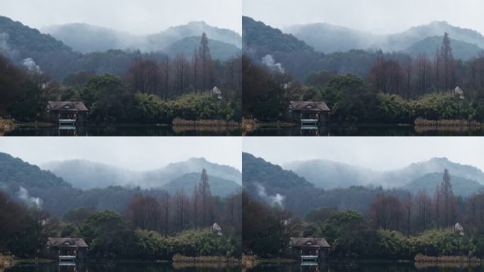 阴雨天的西湖浴鹄湾 远山云雾