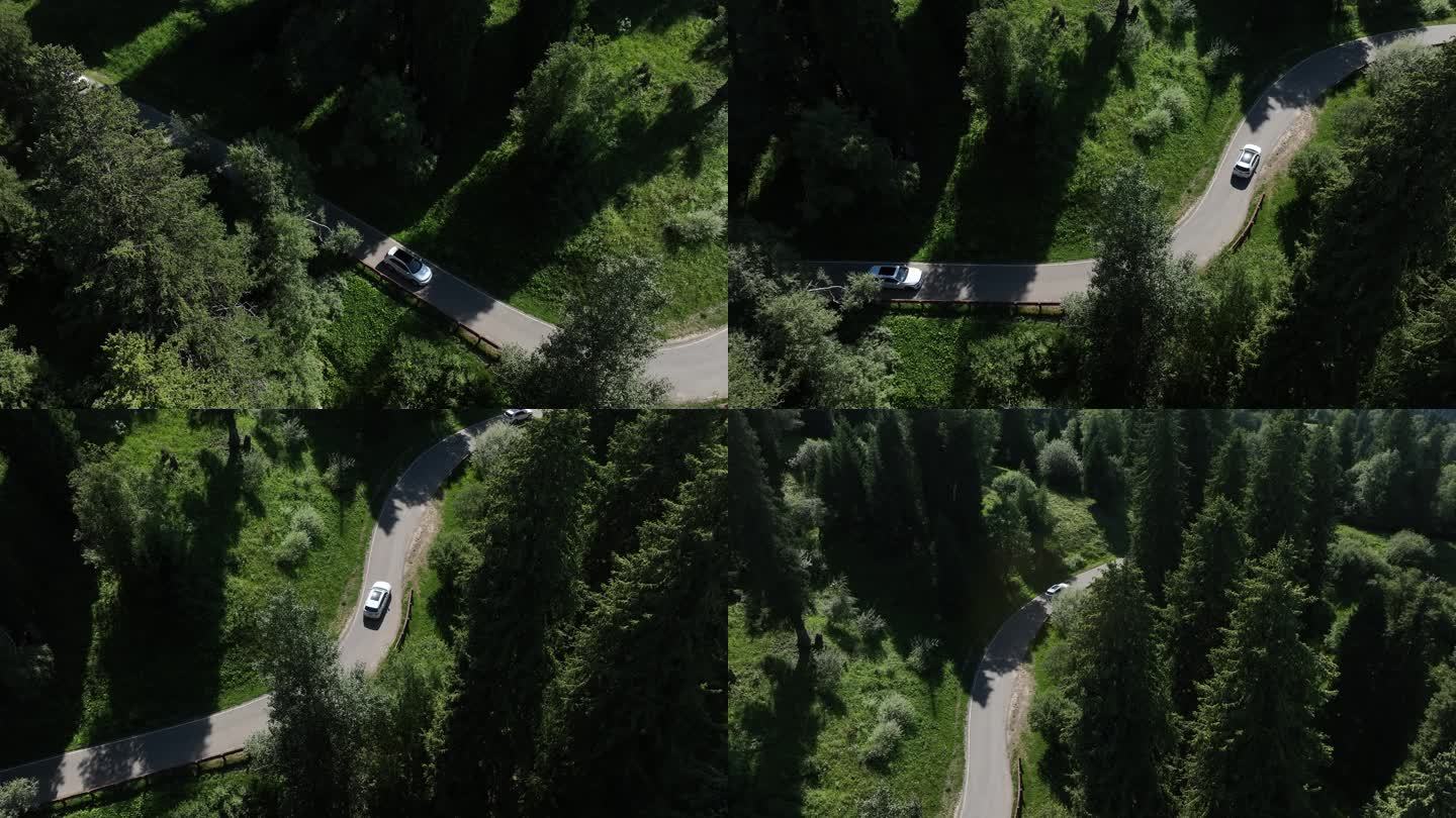 蜿蜒曲折的山间林间的公路行车道