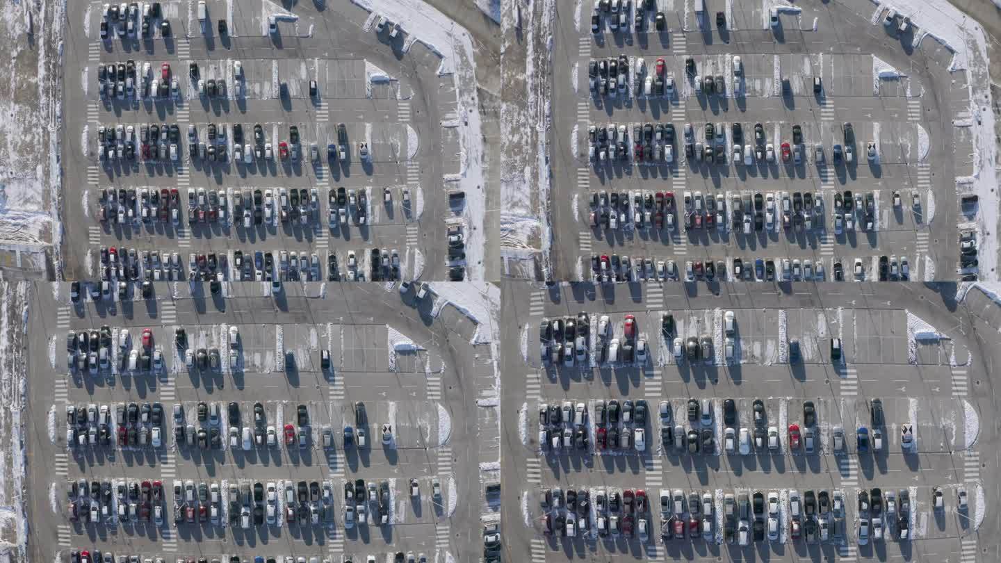 冬天的停车场。雪。长长的影子。