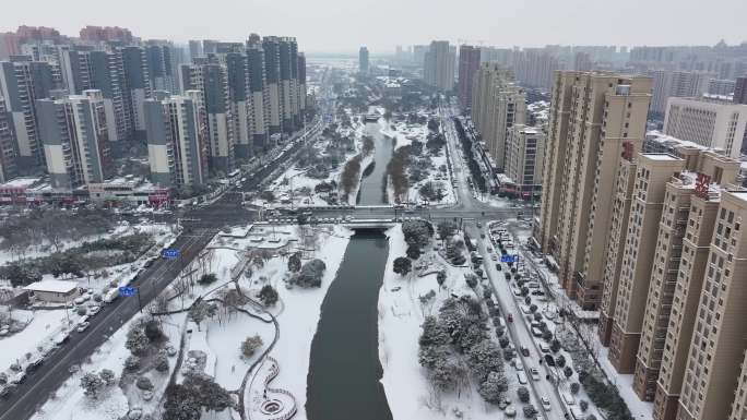 亳州涡阳冬季向阳河河边街道雪景