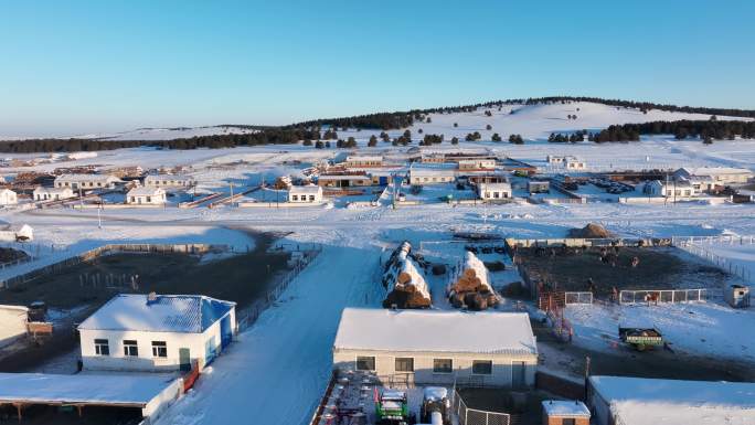 呼伦贝尔雪景山村乡土气息