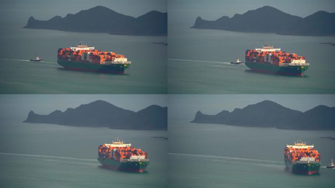 一艘正在缓慢驶入盐田港集装箱码头的货轮
