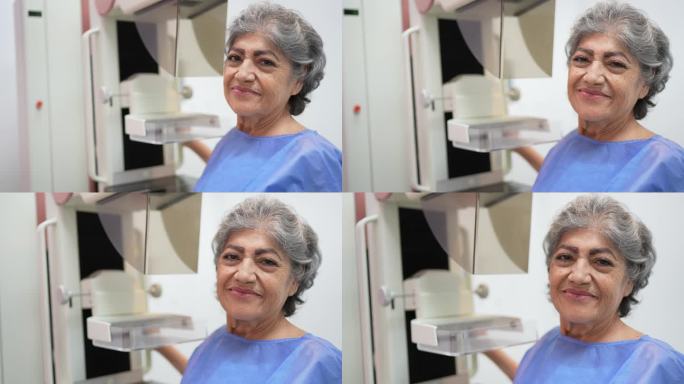 图为一位老年妇女在医院接受乳房x光检查