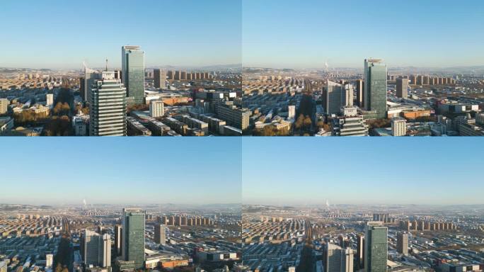 在阳光明媚的日子里，中国山东省淄博市上升的空中。展示华美达和喜来登酒店，背景中可以看到发电厂。