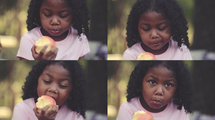 吃苹果的黑人女孩黑人女孩美食文化蔬果建议