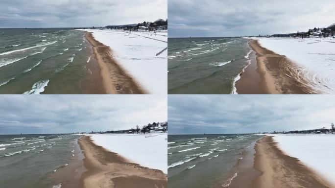 冬天的海浪拍打着沙滩。