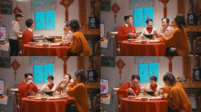 妈妈端菜上桌一家人吃团圆饭