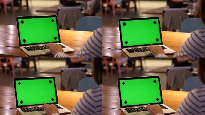 用绿屏笔记本电脑工作