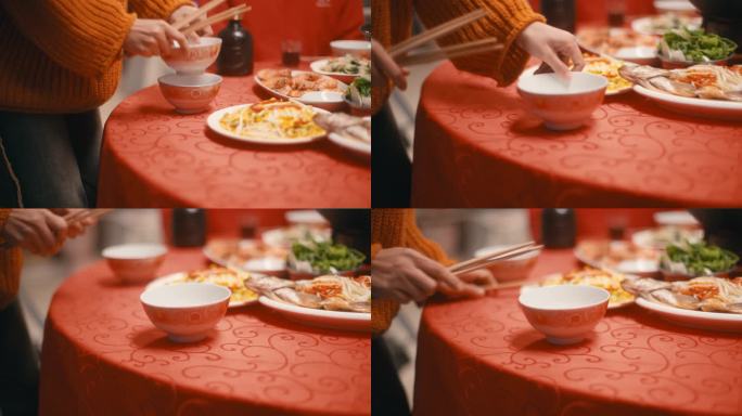 一家人吃团圆饭摆好碗筷