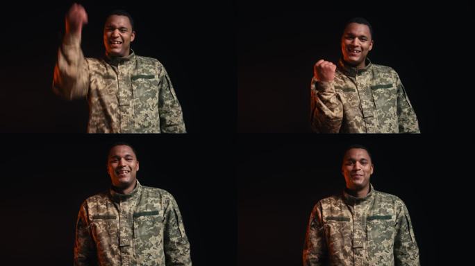 非裔美国军队表示同意，微笑，成功和胜利