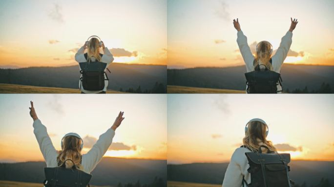 慢镜头的年轻女子带着耳机徒步旅行，欣赏日出时的山景