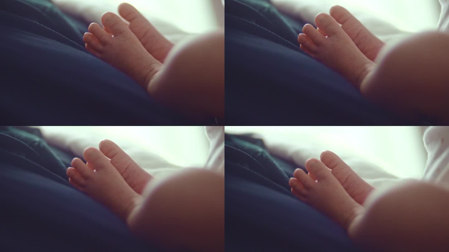 新生儿的脚温柔护理可爱小脚运动发育