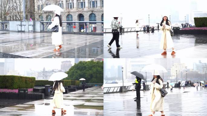 上海外滩雨天打伞的小姐姐