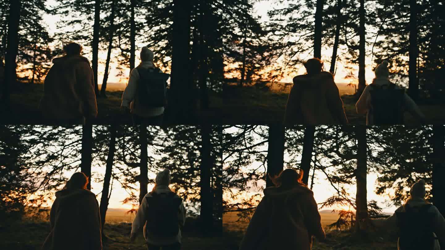 夕阳下，年轻女子在树林中徒步旅行