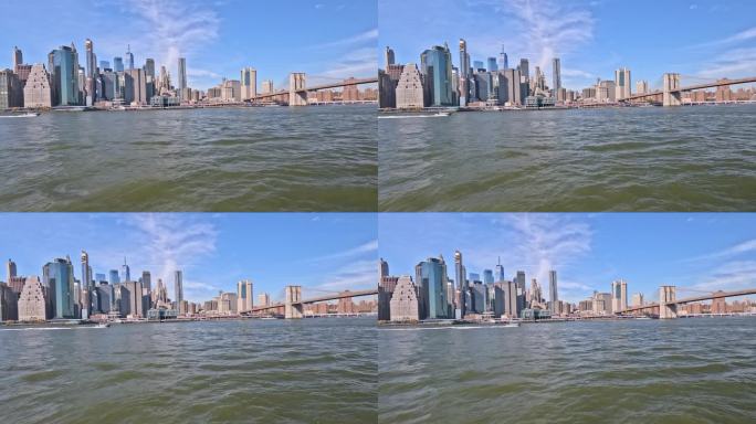 纽约市的全景视图，以曼哈顿中城商业区办公大楼为特色，靠近布鲁克林大桥