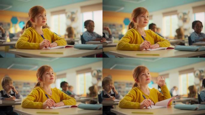 聪明的红发小女孩，穿着鲜艳的衣服，坐在小学的桌子后面。年轻细心的女性在笔记本上写笔记，举手为练习提供