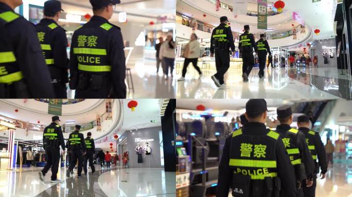 警察在赣州万达商场进行巡逻走路背影