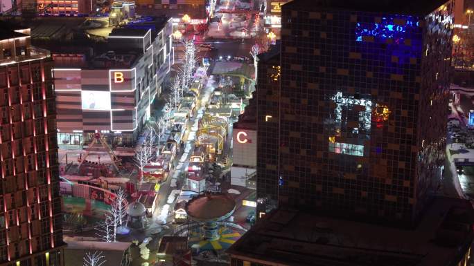 航拍威海市环翠区威高城市广场龙年春节夜景