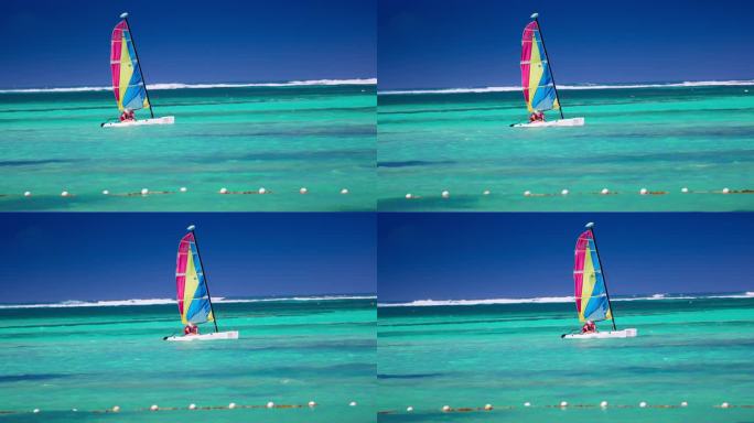 人们航行与双体帆船在加勒比海，热带度假4k视频