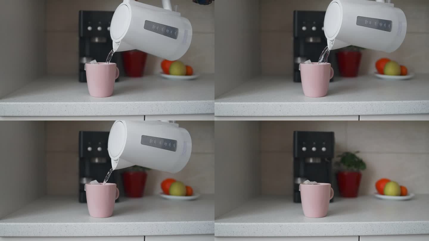 特写热气腾腾的热茶。在厨房里，用一个时髦的咖啡滴漏袋把热水倒进杯子里。在家煮现煮的咖啡