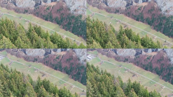 远观救援直升机飞过绿色的瑞士山谷