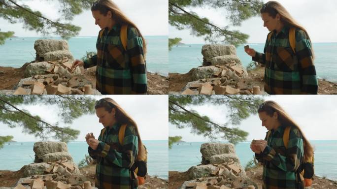 海边的Phaselis城废墟中发现的古代粘土陶器碎片。一位年轻女子在研究它们。