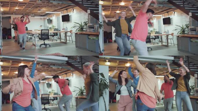 兴奋的同事在现代办公空间庆祝和跳舞